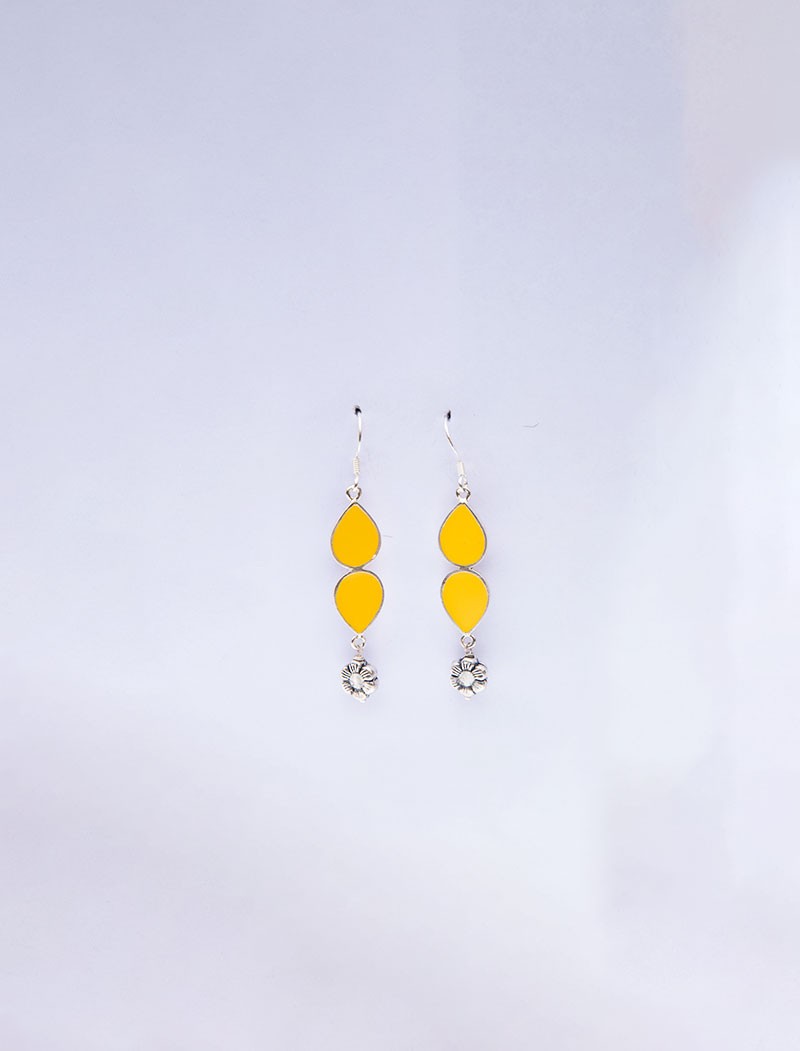 Yellow earrings image displayed in the Related Products section on the Lucknow Souvenirs page Yellow earrings image displayed in the Related Products section on the Lucknow Souvenirs page